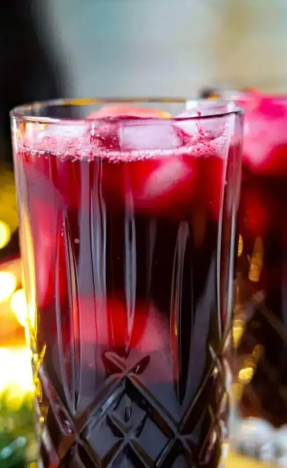 Hibiscus iced tea poured into a glass
