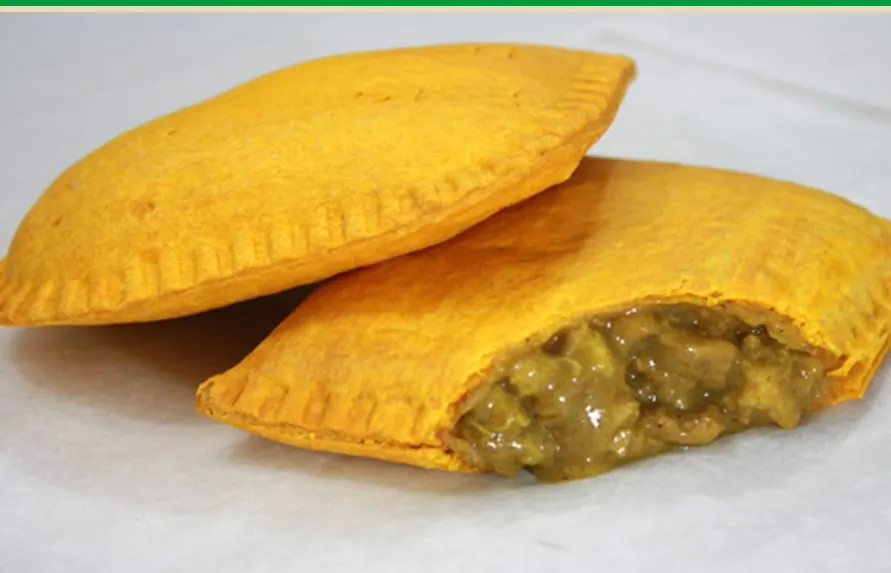 Jamaican chicken patties with golden flaky pastry